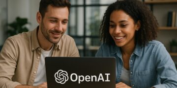 ChatGPT en mand og kvinde sidder på kontor bag computer