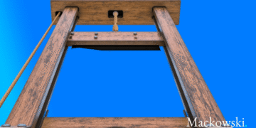 Guillotine af træ som synonym for logikken i straf
