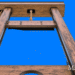 Guillotine af træ som synonym for logikken i straf