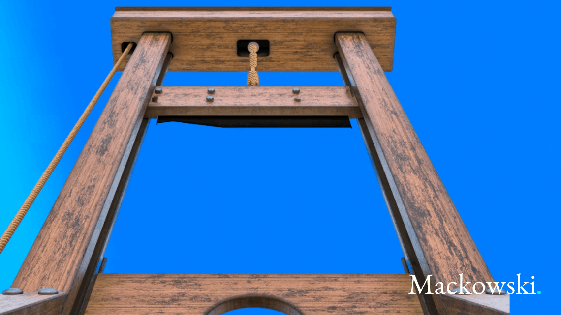 Guillotine af træ som synonym for logikken i straf