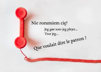 Kommunikation i ledelse - rød telefon og sætninger på fransk, polsk og dansk