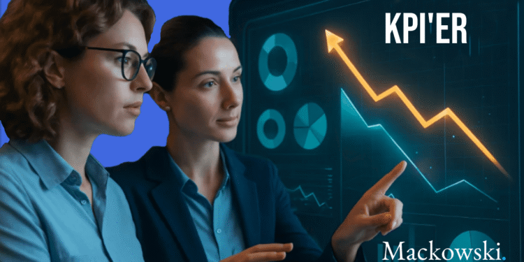 KPI'ER to kvinder betragter KPI board infobillede af Leder Nikolaj Mackowski