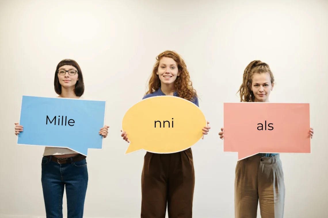 Millennials - 3 unge mennesker for generationen holder 3 skilte i hænderne