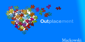 Outplacement forklaret med hjerter puslespil og fading outplacement