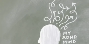 Tegnet hoved med my adhd brain og cirkler som udtryk for neurodivergent