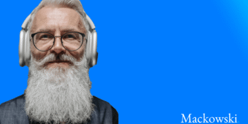 Boomer med langt gråt skæg og høretelefoner infobillede V2.1