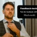 Feedback test stil chef kigger i spejl som metafor for feedback med Mackowski-logo i hvid.