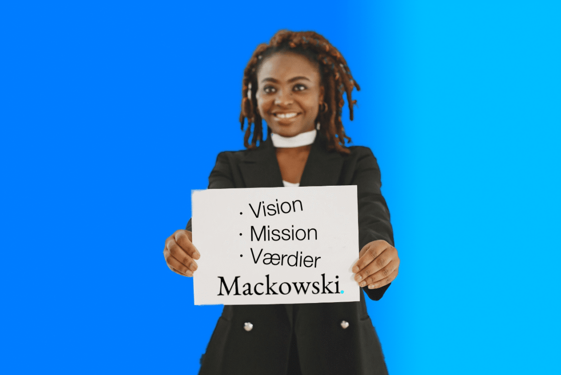 Mission og vision kvinde med et skilt V2.1