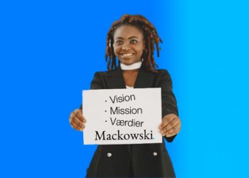 Mission og vision kvinde med et skilt V2.1